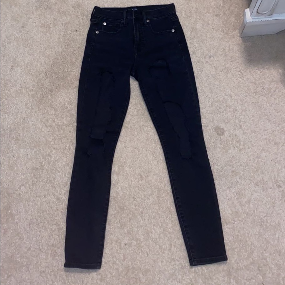 black ripped jeans